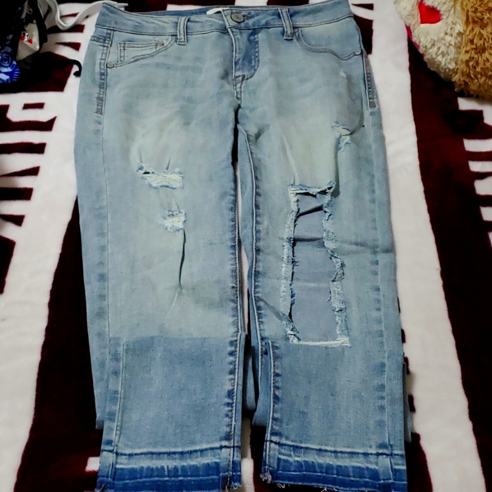 FREE WITH ANY BUNDLE PURCHASE. Never worn, Blue, ripped skinny jeans. Size 3
